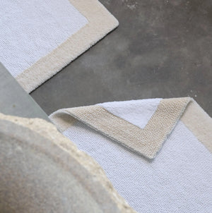 A&H Origine Reversible Bath Rug in 101 Ecru (Border) and 100 White (Inset). 100% Giza Egyptian Cotton Long Staple