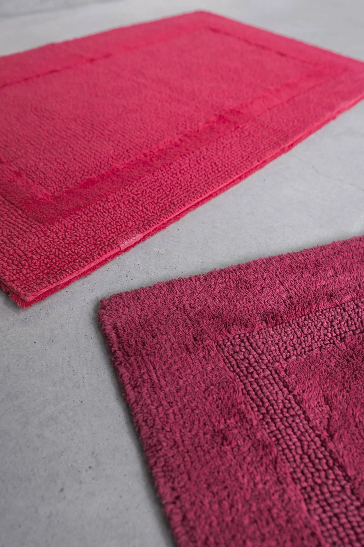 A&H Reversible Rugs in 579 Viva Magenta (top) and 578 Canyon (bottom)