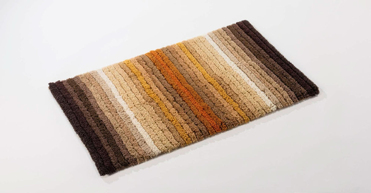The A&H Santa Cruz Bath Rug in 737 Caramel