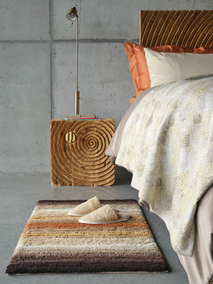 The A&H Santa Cruz Bath Rug in 737 Caramel. A&H Comfy Slippers in 610 Nude