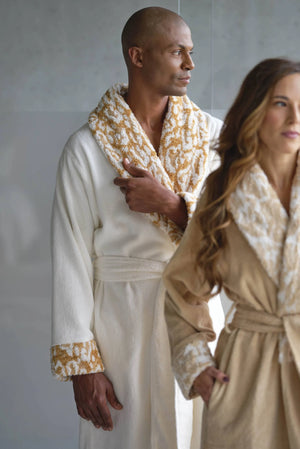 A&H Sauvage Robes. She's wearing colour 714 Sand, and he's wearing colour 840 Gold