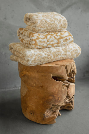 A&H Sauvage Towels, top-to-bottom: 714 Sand, 840 Gold & 714 Sand. Crafted from 100% Egyptian Cotton Extra-Long Staple