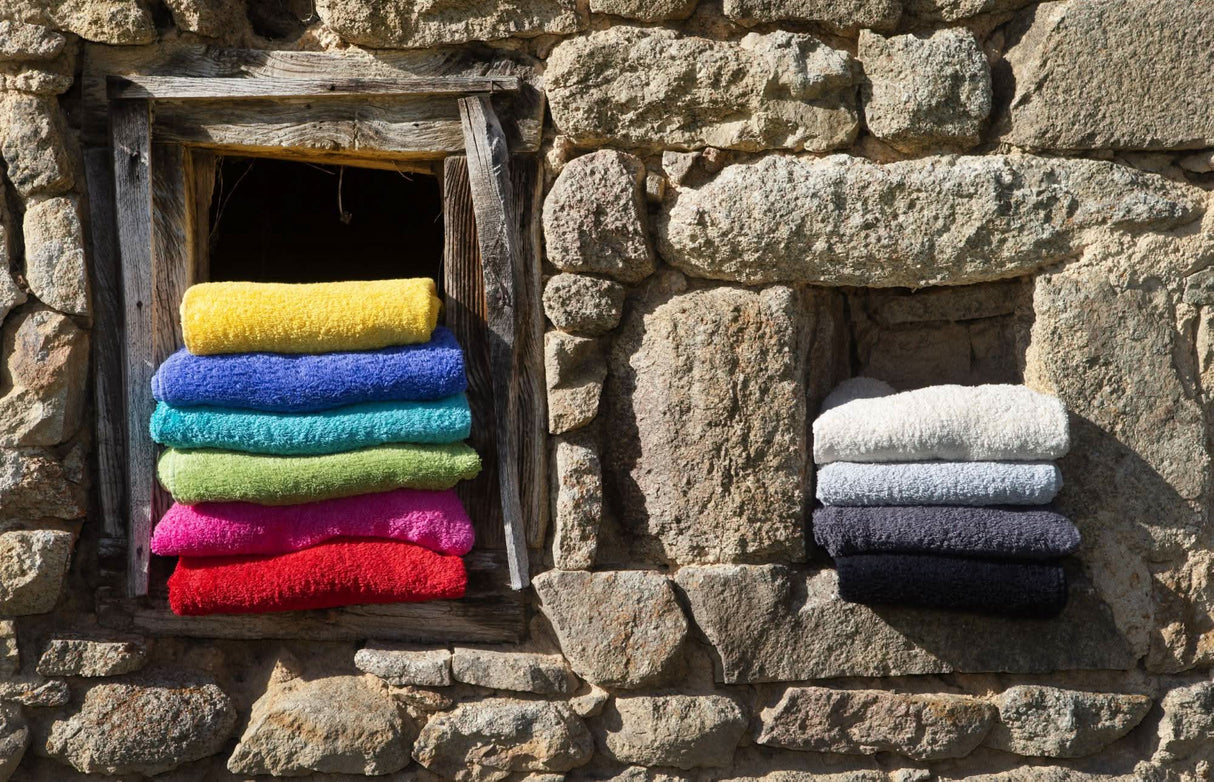 A&H Super Pile Towels (left, top-to-bottom): 830 Banane, 304 Marina, 370 Turquoise, 165 Apple Green, 570 Happy Pink & 564 Carmin. Right (top-to-bottom): 103 Ivory, 992 Platinum, 920 Gris and 990 Black