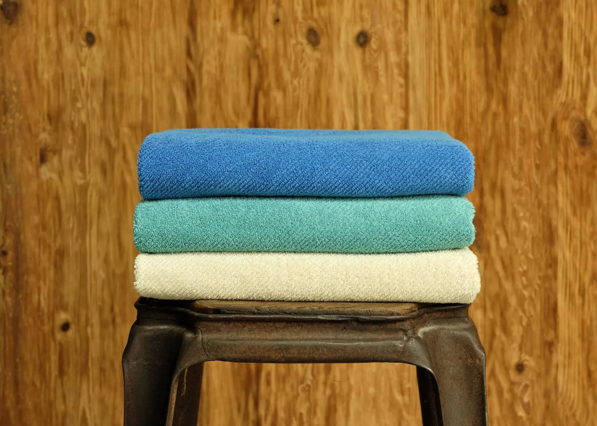 A&H Twill Towels (top-to-bottom) in 304 Marina, 302 Lagoon and 101 Ecru