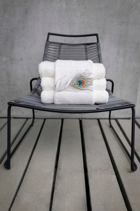 A&H Paleo Hand Towels feature 737 Caramel embroidery. The base hand towel is 100 White