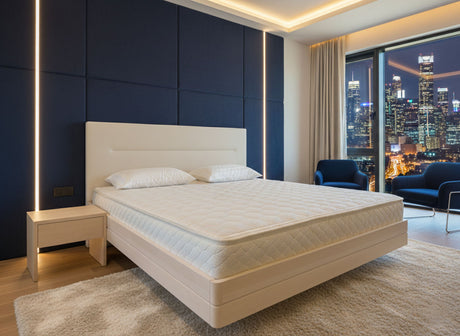 Berkeley Ergonomics Rome Hybrid Mattress on a TEAM 7 float bed, with a TEAM 7 lunetto side table. Alder wood, white oil finish + Sera Snow worsted wool fabric headboard. Background is AI imagined