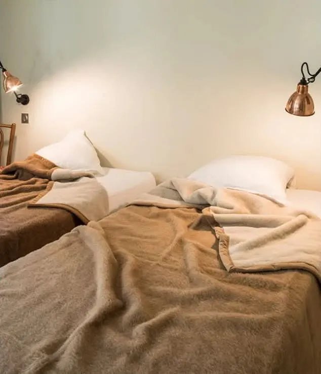 Chamois / Crème (left), Café / Crème (right). 100% Alpaca Blankets by Brun de Vian-Tiran