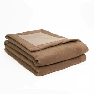 Ispahan is a double-faced 100% pure Camel hair - Blond (light) and Natural (dark) reversible winter-weight blanket