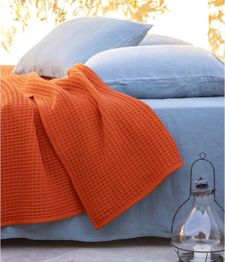 Nuage blanket in Tangerine by Brun de Vian-Tiran. Available in Canada & USA @ TMASC