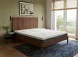 Made in Calgary, our Paradigm hybrid mattress is comfortable, durable, supportive and affordable. Background is AI imagined.
