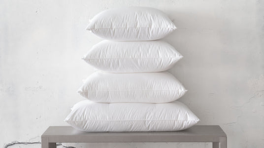 Top-to-bottom: Regular, Standard, Queen & King St Genève down-filled pillows. King pillows are uniquely made with 3 separate chambers of down fill