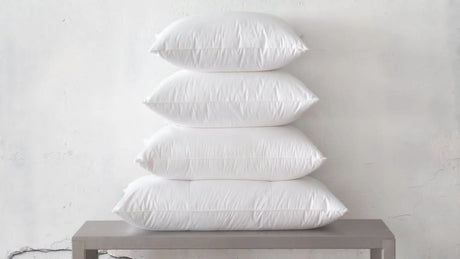 Top-to-bottom: Regular, Standard, Queen & King St Genève down-filled pillows. King pillows are uniquely made with 3 separate chambers of down fill