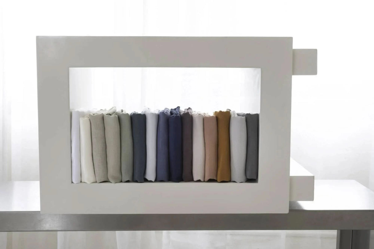 St Genève Echo Linen, left-to-right: Paper, Vanilla, Linen, Lemongrass, Eucalyptus, Atlantic, Sky, Admiral, Marina, Plum, Petal, Rhubarb, Copper, Mist and Shale