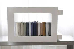 St Genève Echo Linen, left-to-right: Paper, Vanilla, Linen, Lemongrass, Eucalyptus, Atlantic, Sky, Admiral, Marina, Plum, Petal, Rhubarb, Copper, Mist and Shale