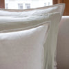St Genève Echo Linen in Lemongrass (middle knife-edge pillow)