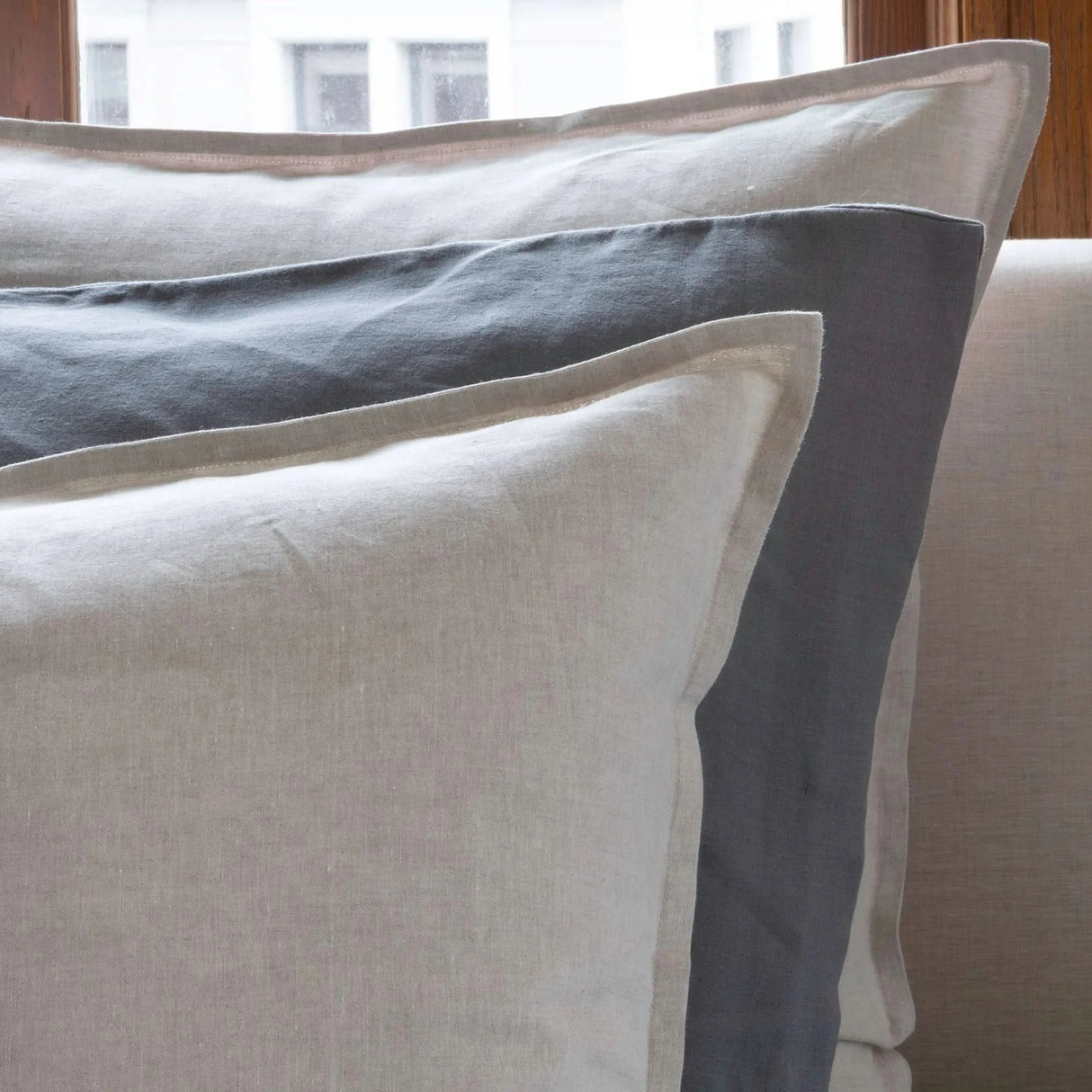 St Genève Echo Linen in Shale (middle knife-edge pillow)