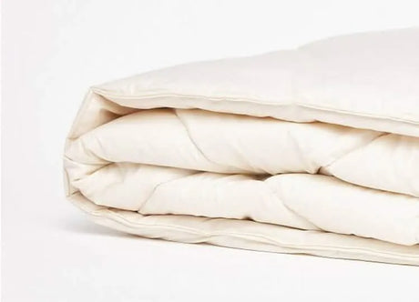 Piatra Duvets are Made in Romania. The shell is 100% cotton and the fill is 100% sheep's wool
