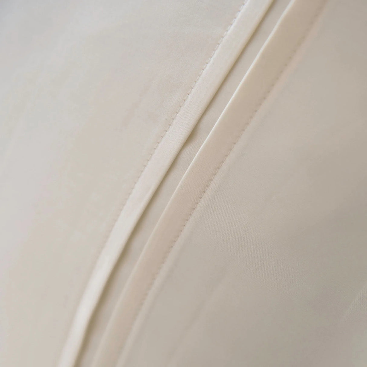 St Genève Regency in Cream. Closeup of the double-face tuck pleat detail