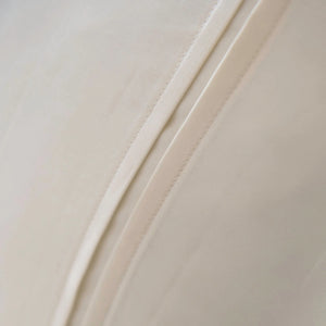 St Genève Regency in Cream. Closeup of the double-face tuck pleat detail