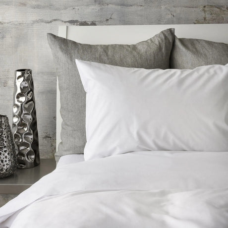 St Genève Sintra 300 thread count percale bedding in crisp white. Available in duvet covers, flat/fitted sheets, shams and pillowcases