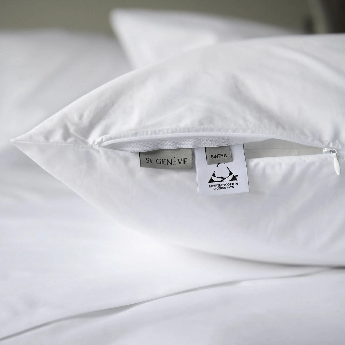 St Genève Sintra 300-thread-count percale bedding in crisp white. Close-up of the sham zippered closure