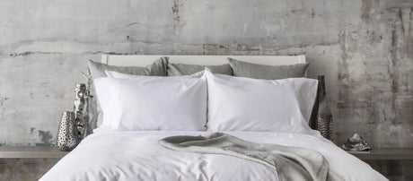 St Genève Sintra 300 thread count percale bedding in crisp white. Available in duvet covers, flat/fitted sheets, shams and pillowcases