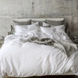 St Genève Sintra 300 thread count percale bedding in crisp white. Available in duvet covers, flat/fitted sheets, shams and pillowcases