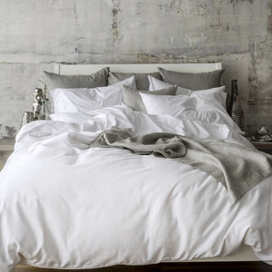 St Genève Sintra 300 thread count percale bedding in crisp white. Available in duvet covers, flat/fitted sheets, shams and pillowcases