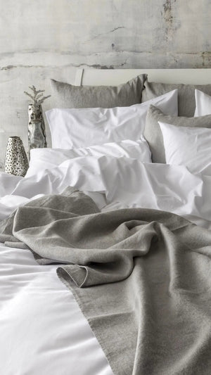 St Genève Sintra 300 thread count percale bedding in crisp white. Available in duvet covers, flat/fitted sheets, shams and pillowcases