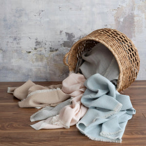 Soho Throws, Left-to-right: Pecan (taupe), Mist (gray), Cameo (pink), Seaglass (blue)