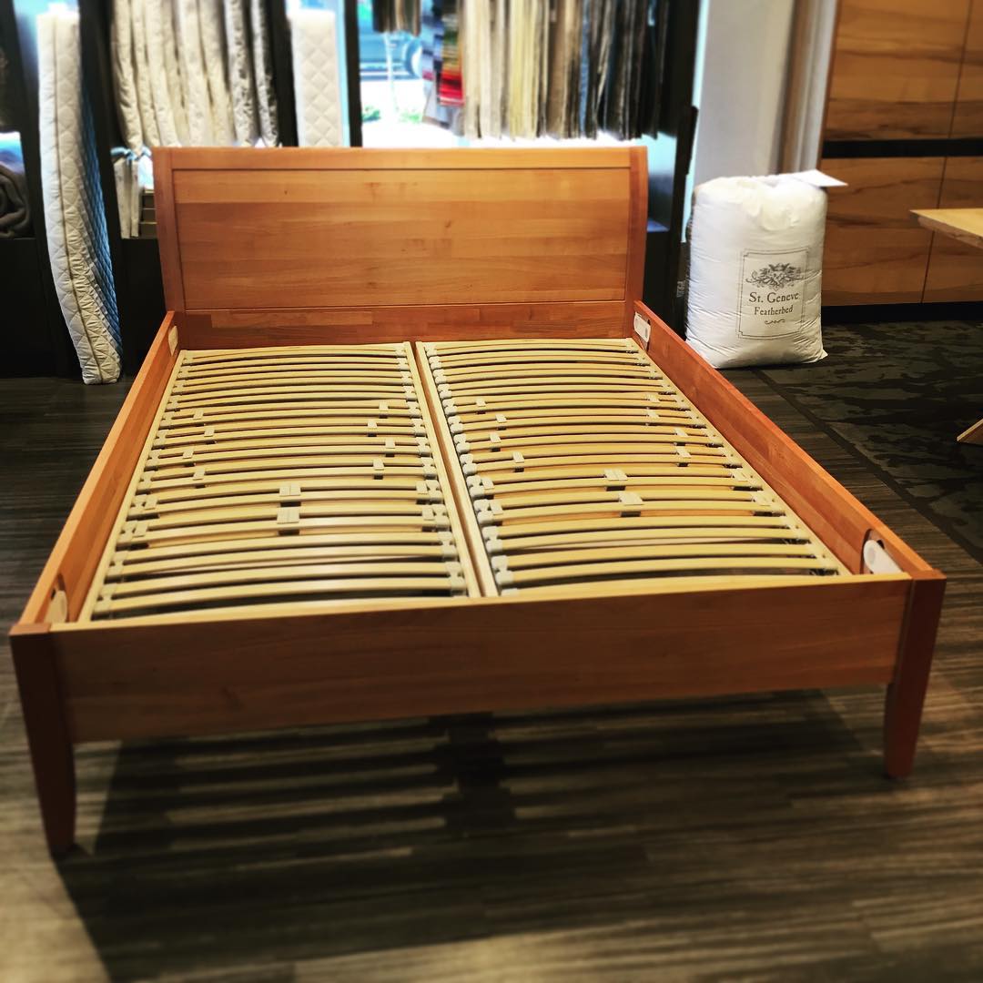 TEAM 7 sesam bed in cherry w/ Berkeley Ergonomics Suspension Slats. Photograhed in our Calgary showroom