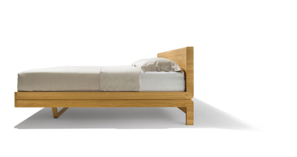 Float Bed with a Tall Wood Headboard