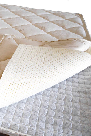 A closeup of the natural latex + micro pocket spring mattress topper. Wonderfully adaptive and supportive.